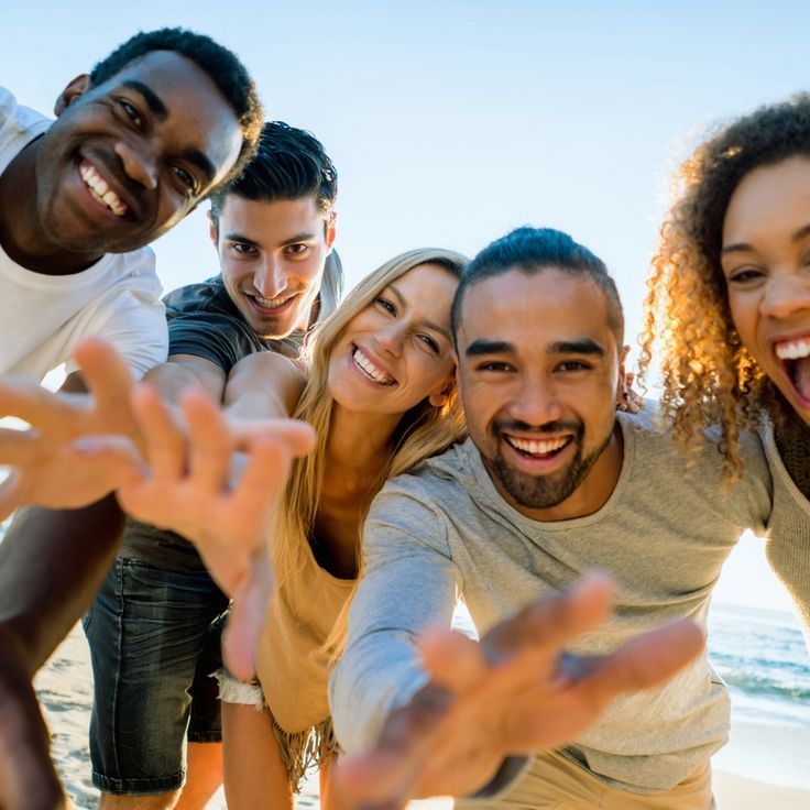 Group of happy friends on a beach